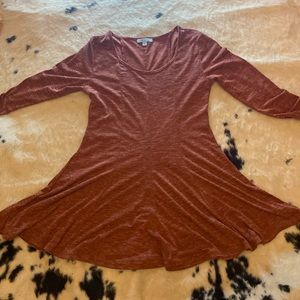 Mid length orange She + Sky dress. Very soft and movable. Never worn.